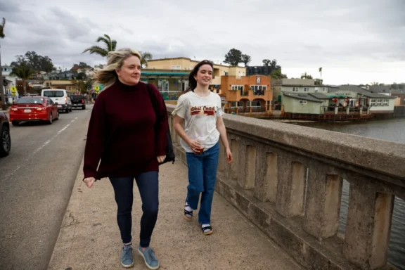 San Jose woman, rescued from raging ocean, uses watch to find phone buried in sand